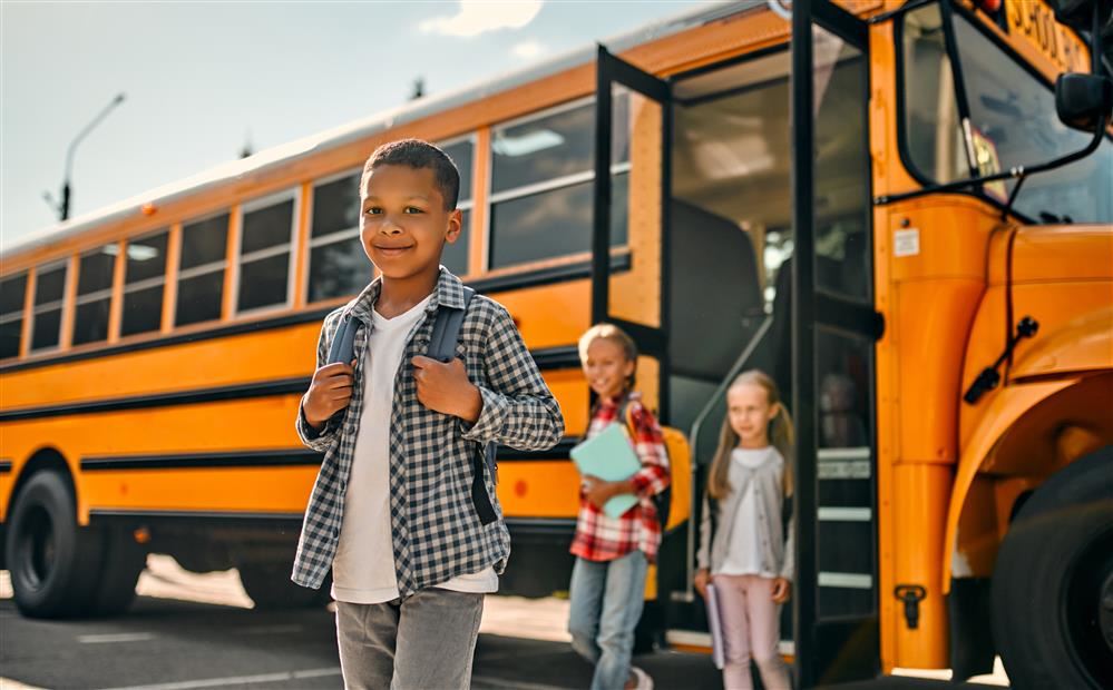  kids getting off school bus